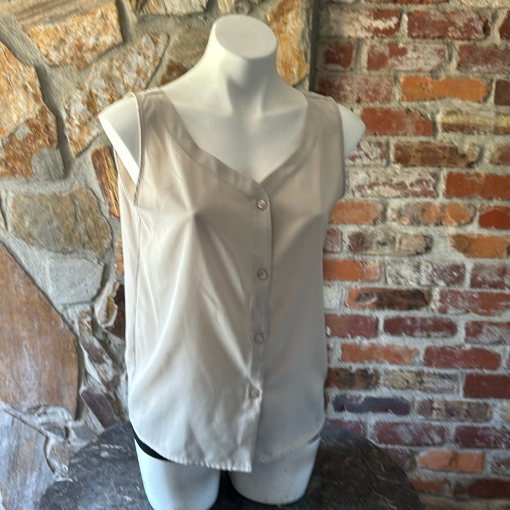 martinique cream blouse. 100% polyester.  Great for summer!!!!